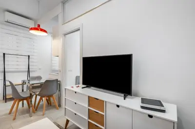 Una televisión o centro de entretenimiento en Modern apartment - 1Bedroom 1Bathroom - Chueca