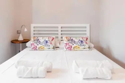 Cama o camas de una habitación en Cozy Modern with balconies - Sol - Gran Vía