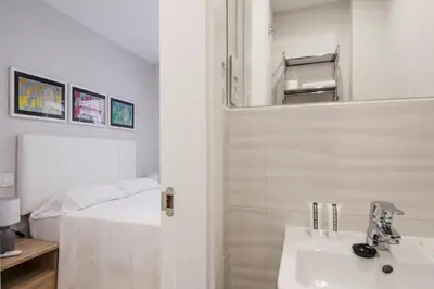 Cama o camas de una habitación en Cozy 1BD San Miguel-Plaza Mayor city centre