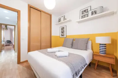 Cama o camas de una habitación en Cozy Apartment- 2BD 2BT- Malasaña