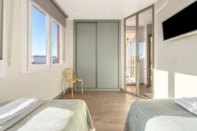 Cama o camas de una habitación en Bright W Terrace -2 bedrooms 2 bathrooms-Chamberi