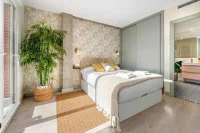 Cama o camas de una habitación en Bright W Terrace -2 bedrooms 2 bathrooms-Chamberi
