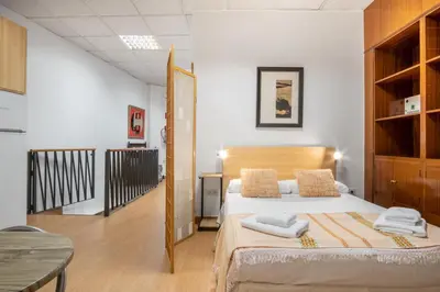 Cama o camas de una habitación en Cozy and Vintage-2Bedrooms 1.5Bathrooms-Malasaña