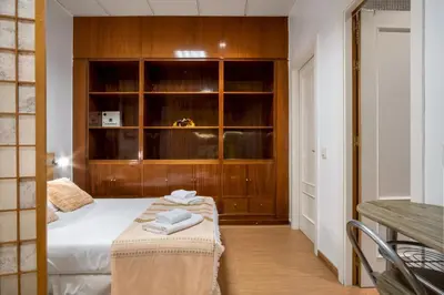 Cama o camas de una habitación en Cozy and Vintage-2Bedrooms 1.5Bathrooms-Malasaña