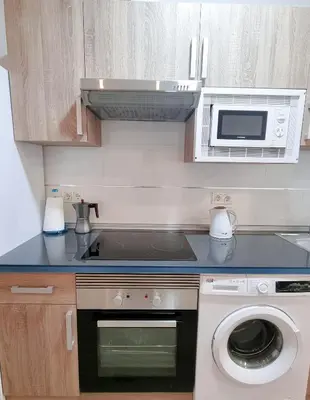 Una cocina o zona de cocina en Metropolitan apartments