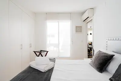 Cama o camas de una habitación en For You Rentals Precioso Apartamento TEMPORAL Preciados PRE105B