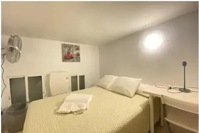 Cama o camas de una habitación en Ile Buena Vista Exterior Temporal