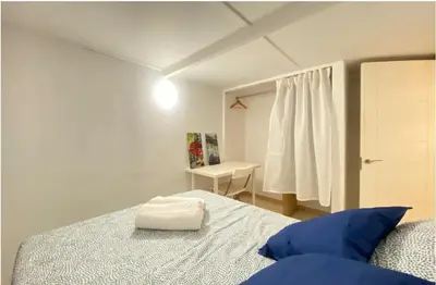 Cama o camas de una habitación en Ile Buena Vista Exterior Temporal