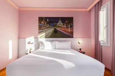 Cama o camas de una habitación en Ikonik Gran Vía