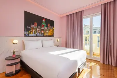 Cama o camas de una habitación en Ikonik Gran Vía