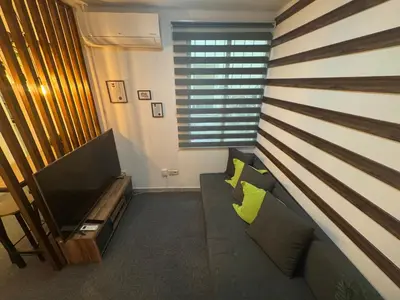 Una televisión o centro de entretenimiento en Céntrico y precioso apartamento en madrid