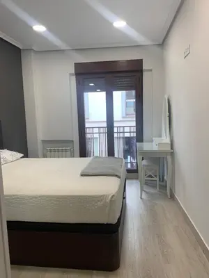 Cama o camas de una habitación en Apartamento Deluxe, 4 habitaciones, Parking