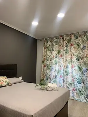 Cama o camas de una habitación en Apartamento Deluxe, 4 habitaciones, Parking