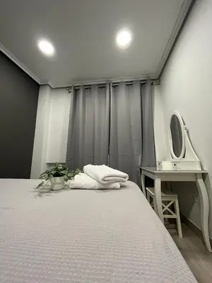Cama o camas de una habitación en Apartamento Deluxe, 4 habitaciones, Parking
