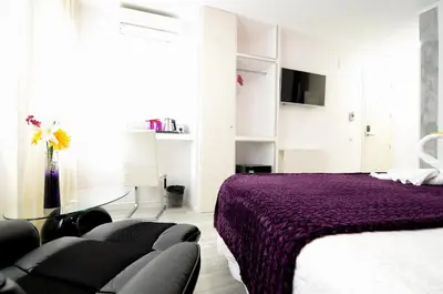 Cama o camas de una habitación en Hostal Alexis Madrid