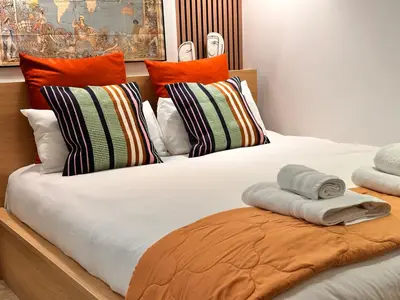 Cama o camas de una habitación en Opera Suite Norma - Estudio 2 habitaciones Madrid Palacio Real