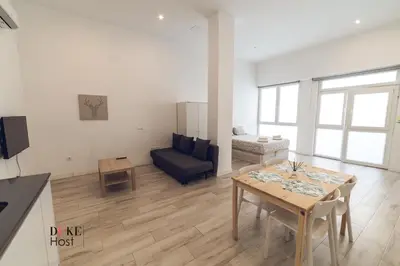 Una televisión o centro de entretenimiento en Santa Maria de la cabeza Apartments