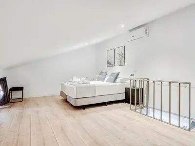 Cama o camas de una habitación en Limehome Madrid Calle Ave María - estancia temporal