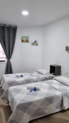 Cama o camas de una habitación en Hostal Vara Madrid