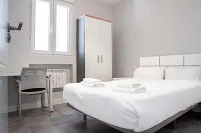 Cama o camas de una habitación en Luz y Diseño en Retiro - Apartamento de 4 Dormitorios