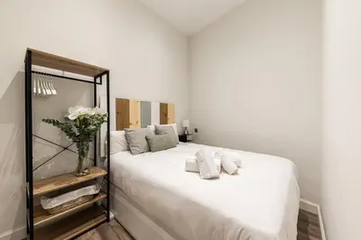 Cama o camas de una habitación en Waou La Latina III - Alquiler Corta Duración