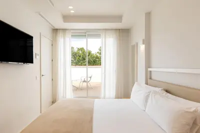Cama o camas de una habitación en Uma Suites O'Donnell
