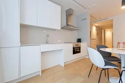 Una cocina o zona de cocina en Uma Suites O'Donnell