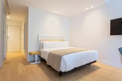 Cama o camas de una habitación en Uma Suites O'Donnell
