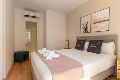 Cama o camas de una habitación en Limehome Madrid Calle de Fomento - estancia temporal