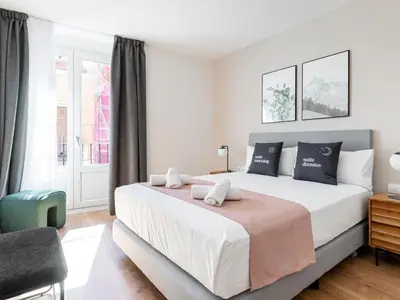 Cama o camas de una habitación en Limehome Madrid Calle de Fomento - estancia temporal