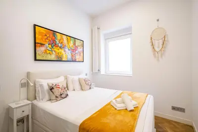 Cama o camas de una habitación en For You Rentals Apartment TEMPORAL in the Center of Madrid ESP50
