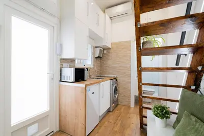 Una cocina o zona de cocina en Estudio acogedor para 1-2 personas. WIFI L.CABRERA