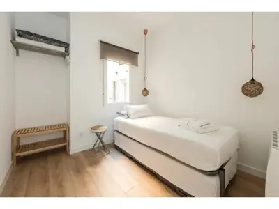 Cama o camas de una habitación en Apartamento 3 Habs enfrente de Atocha Mendez3º