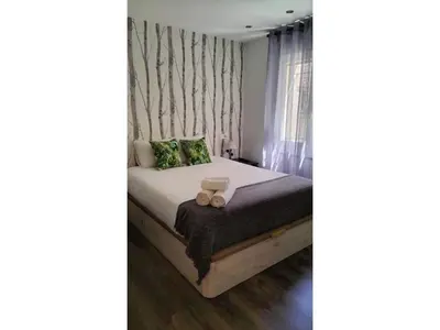 Cama o camas de una habitación en Tranquilo apartamento 5 pers. Madrid Río Mendoza