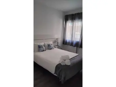 Cama o camas de una habitación en Tranquilo apartamento 5 pers. Madrid Río Mendoza