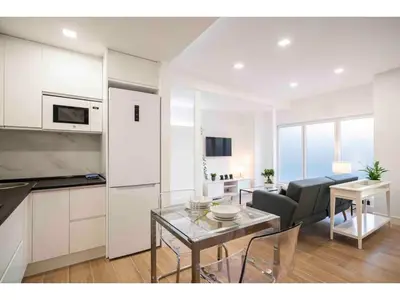 Una cocina o zona de cocina en Precioso apartamento a pie de calle - Retiro- Dr Laguna