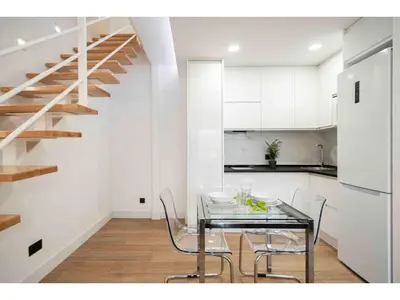 Una cocina o zona de cocina en Precioso apartamento a pie de calle - Retiro- Dr Laguna