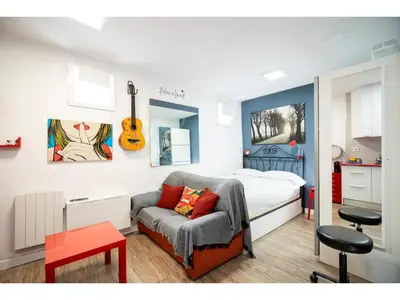 Cama o camas de una habitación en Precioso estudio en Lavapies Salitre