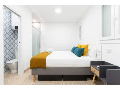 Cama o camas de una habitación en Acogedor y silencioso estudio M1 Embajadores