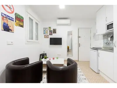 Una cocina o zona de cocina en Acogedor y silencioso estudio M1 Embajadores