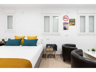 Cama o camas de una habitación en Acogedor y silencioso estudio M1 Embajadores
