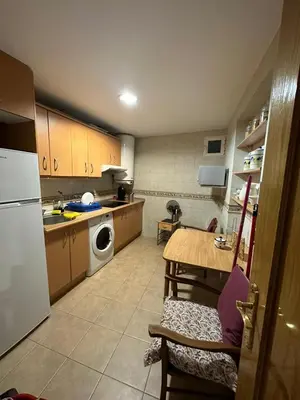 Una cocina o zona de cocina en PUERTA DEL SOL Carretas APARTAMENTS & Rooms