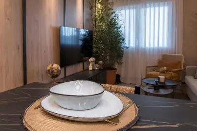 Una televisión o centro de entretenimiento en JUAN BRAVO Apartamento a estrenar con PISCINA