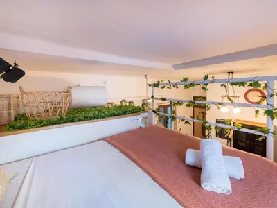 Cama o camas de una habitación en El Hogar de La Sierpe