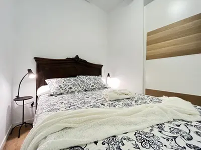 Cama o camas de una habitación en Ile Aina Malasaña Temporal