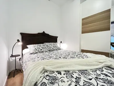 Cama o camas de una habitación en Ile Aina Malasaña Temporal