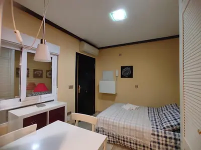 Cama o camas de una habitación en Estudio Lorenzo Acogedor Temporal