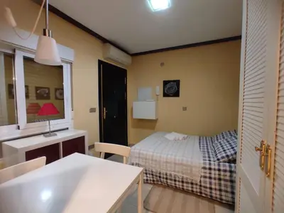 Cama o camas de una habitación en Estudio Lorenzo Acogedor Temporal