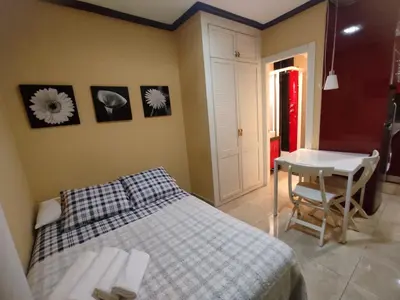 Cama o camas de una habitación en Estudio Lorenzo Acogedor Temporal