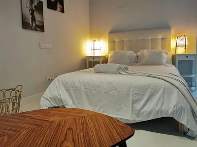 Cama o camas de una habitación en La Estancia de Leganitos